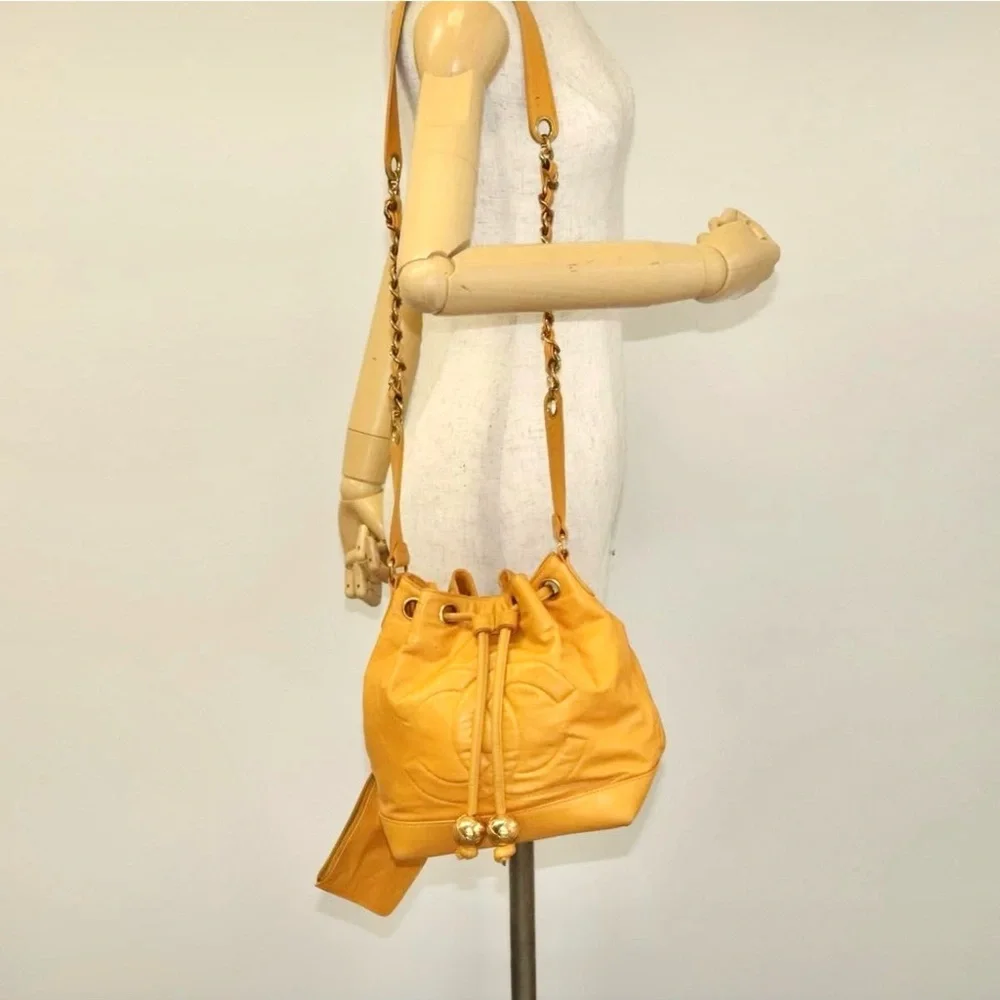 Authentic CHANEL yellow lambskin bucket bag with wallet pouch